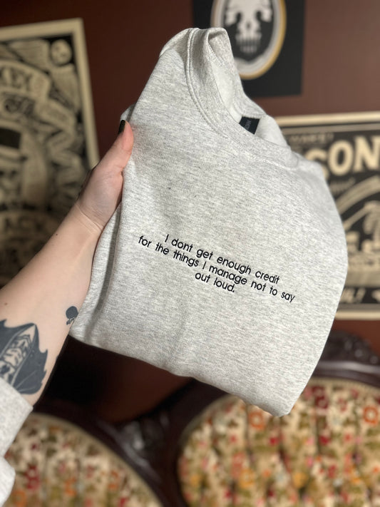 Don’t Get Enough Credit Embroidered Sweatshirt