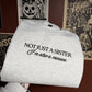 Not Just A Sister Embroidered Sweatshirt