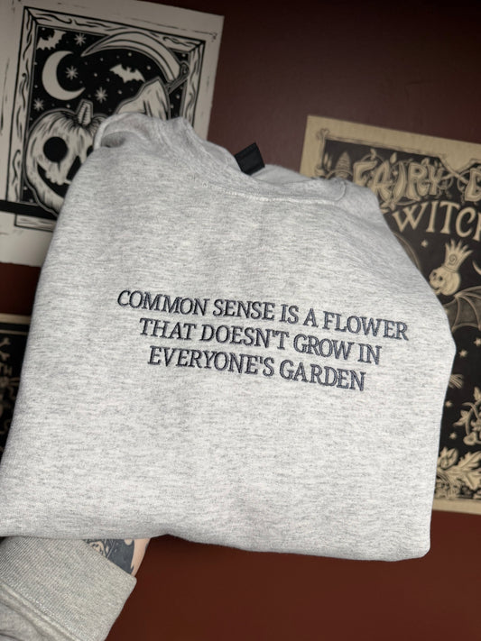 Common Sense Embroidered Sweatshirt